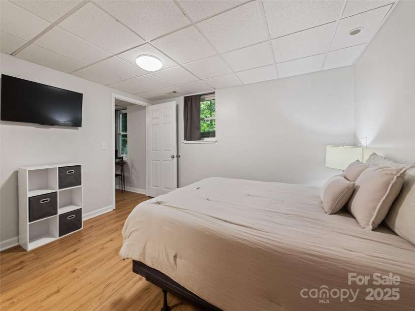 263 Blanton Street, Columbus, NC 28722.  MLS# CAR4190973, YatesRealty ID 7130. Basement Room With A Bed & Closet