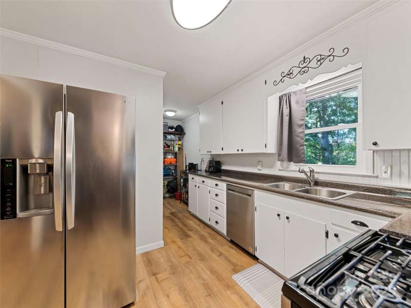 263 Blanton Street, Columbus, NC 28722.  MLS# CAR4190973, YatesRealty ID 7130. Kitchen View Of Storage Area