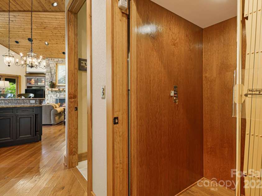 197 Cherry Knob Drive, Mars Hill, NC 28754.  MLS# CAR4271284, YatesRealty ID 7144. Convenient in-home elevator offers effortless access to all levels—ideal for multi-generational living or transporting groceries with ease.