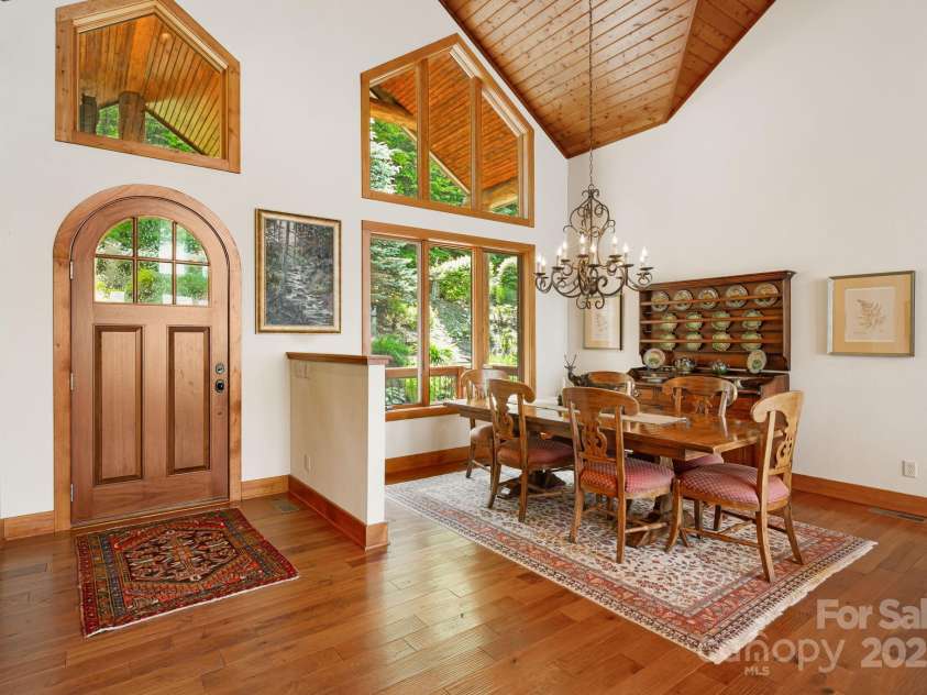 197 Cherry Knob Drive, Mars Hill, NC 28754.  MLS# CAR4271284, YatesRealty ID 7144. Vaulted ceilings and picture windows highlight this inviting dining space just off the main entry.