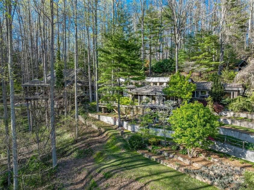 633 Upper Herron Cove Road, Asheville, NC 28804.  MLS# CAR4248389, YatesRealty ID 7146. View of the tree house in the distances