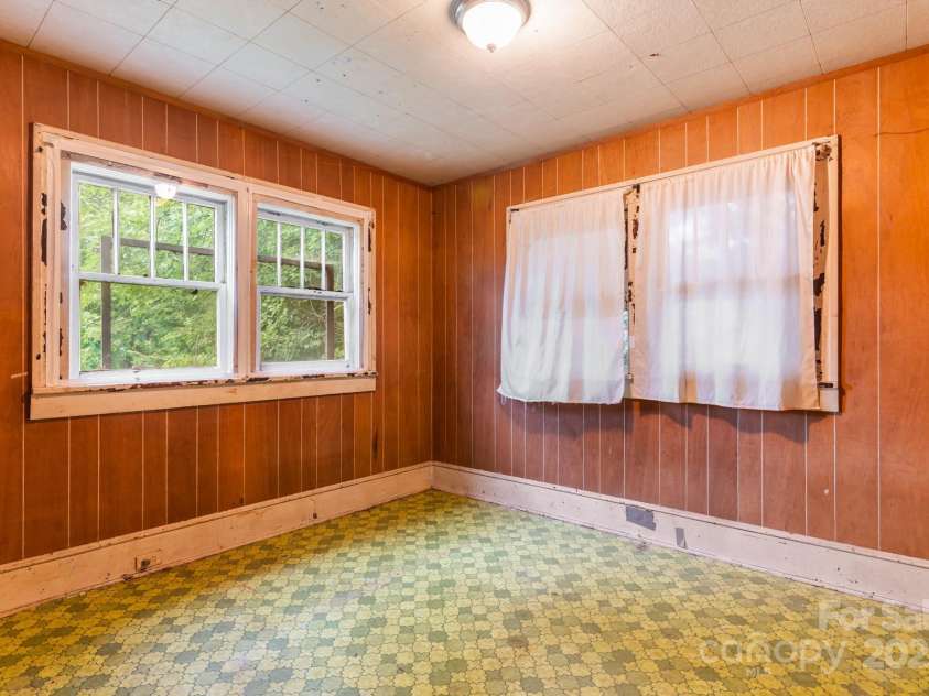 96 French Broad Avenue, Asheville, NC 28801.  MLS# CAR4205683, YatesRealty ID 715. Back bedroom