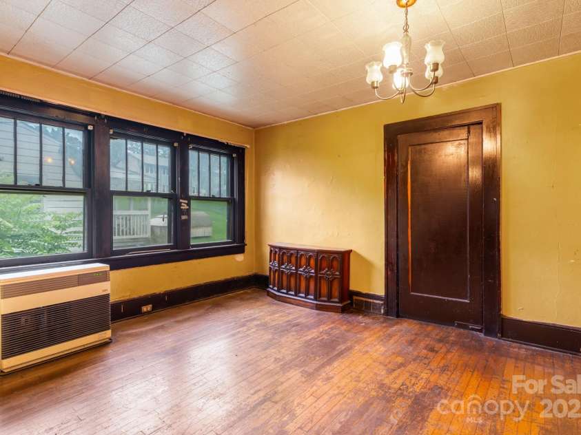 96 French Broad Avenue, Asheville, NC 28801.  MLS# CAR4205683, YatesRealty ID 715. Large dining room