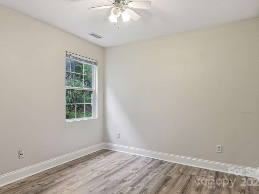 10 Grove End Road, Fletcher, NC 28732.  MLS# CAR4285704, YatesRealty ID 7150. Bedroom 2 on main level