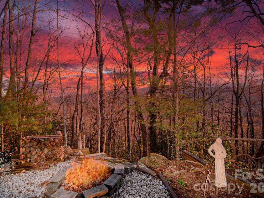 299 Carriage Summitt Way, Hendersonville, NC 28791.  MLS# CAR4400297, YatesRealty ID 7150. Winter Sunset view - Lower Fire Pit