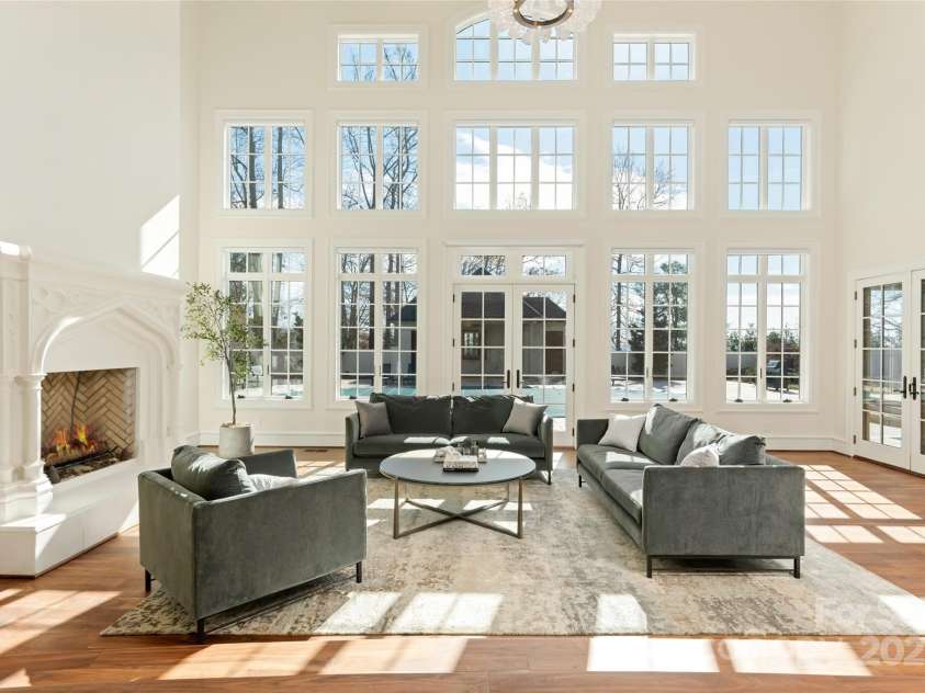 316 Braeside Court, Asheville, NC 28803.  MLS# CAR4198099, YatesRealty ID 7157. Gorgeous natural light from the wall of windows fills the heart of the home