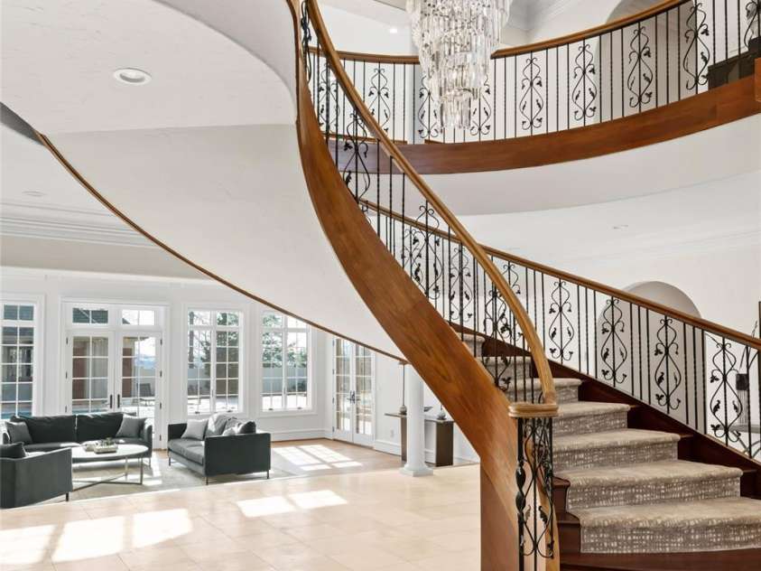 316 Braeside Court, Asheville, NC 28803.  MLS# CAR4198099, YatesRealty ID 7157. The grand staircase greets you and opens up to the 2-story great room