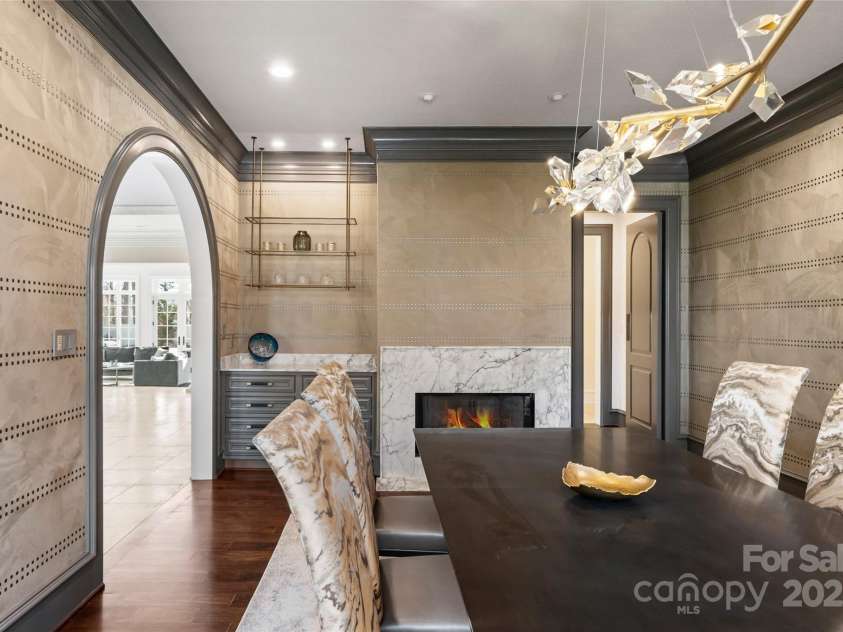 316 Braeside Court, Asheville, NC 28803.  MLS# CAR4198099, YatesRealty ID 7157. With its own re-finished marble fireplace surround and unique suede wallpaper