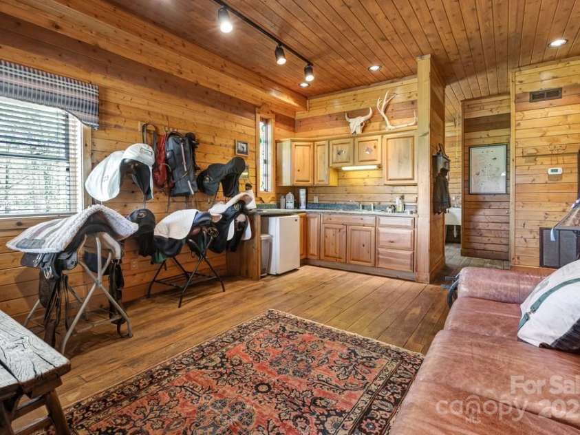 201 Hughes Creek, Columbus, NC 28722.  MLS# CAR4259120, YatesRealty ID 716. Owner's tack room with kitchenette 