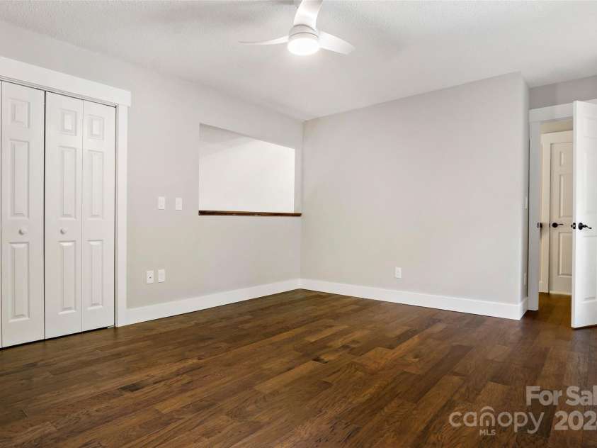 8 Tree Top Place, Black Mountain, NC 28711.  MLS# CAR4193609, YatesRealty ID 7161. 2nd floor bedroom #1 w/ loft window