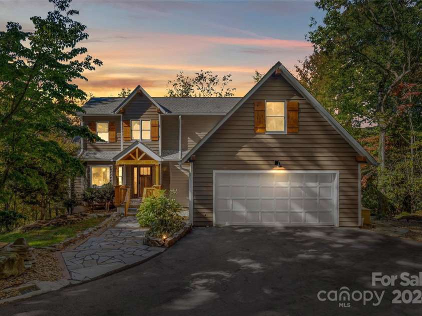 8 Tree Top Place, Black Mountain, NC 28711.  MLS# CAR4193609, YatesRealty ID 7161. 8 Tree Top Place at twilight