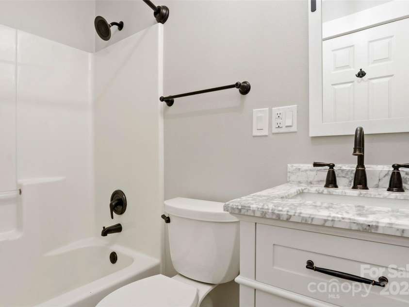 8 Tree Top Place, Black Mountain, NC 28711.  MLS# CAR4193609, YatesRealty ID 7161. Basement full bath
