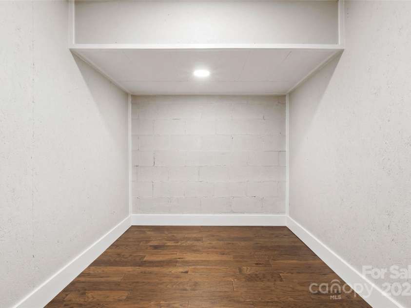 8 Tree Top Place, Black Mountain, NC 28711.  MLS# CAR4193609, YatesRealty ID 7161. Basement storage room