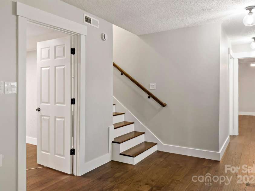 8 Tree Top Place, Black Mountain, NC 28711.  MLS# CAR4193609, YatesRealty ID 7161. Landing in basement