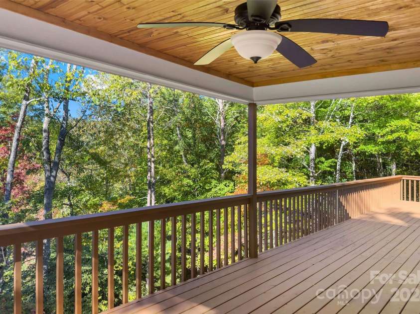8 Tree Top Place, Black Mountain, NC 28711.  MLS# CAR4193609, YatesRealty ID 7161. Main level back deck