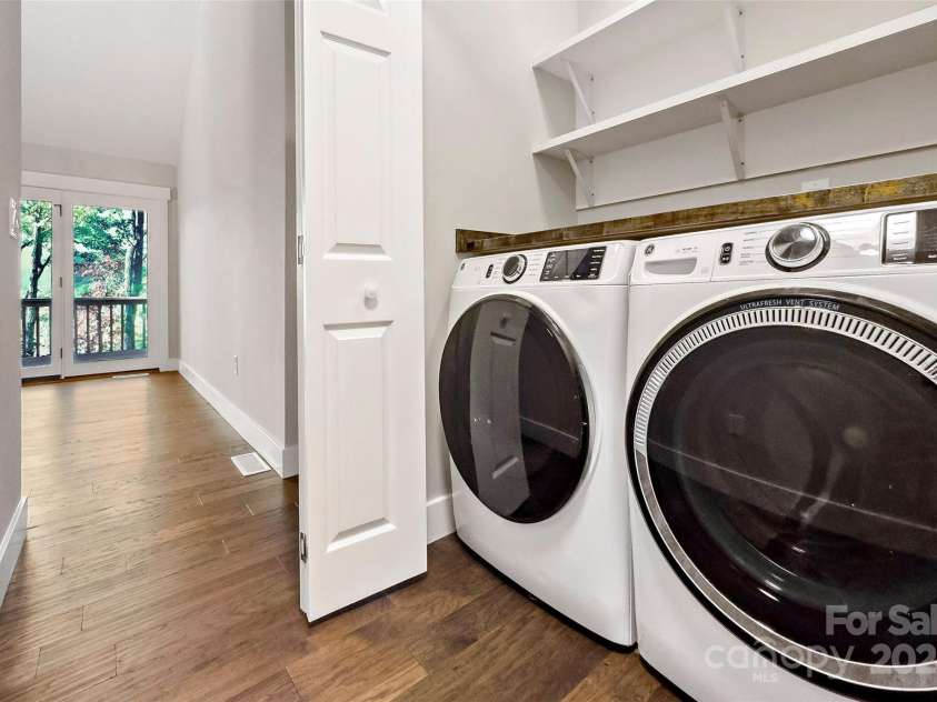 8 Tree Top Place, Black Mountain, NC 28711.  MLS# CAR4193609, YatesRealty ID 7161. Main level laundry closet