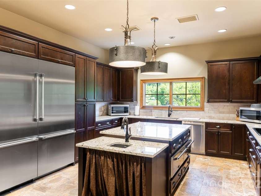 24 Snow Ridge Drive, Hendersonville, NC 28792.  MLS# CAR4239969, YatesRealty ID 7164. Community clubhouse kitchen