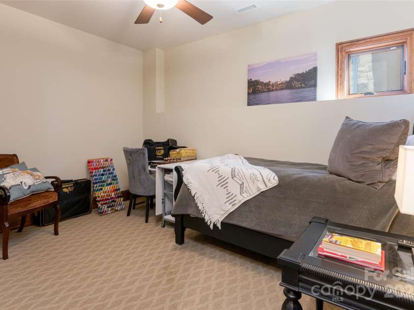 24 Snow Ridge Drive, Hendersonville, NC 28792.  MLS# CAR4239969, YatesRealty ID 7164. Lower level bonus room