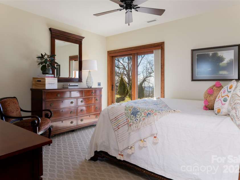 24 Snow Ridge Drive, Hendersonville, NC 28792.  MLS# CAR4239969, YatesRealty ID 7164. Lower level guest bedroom 4