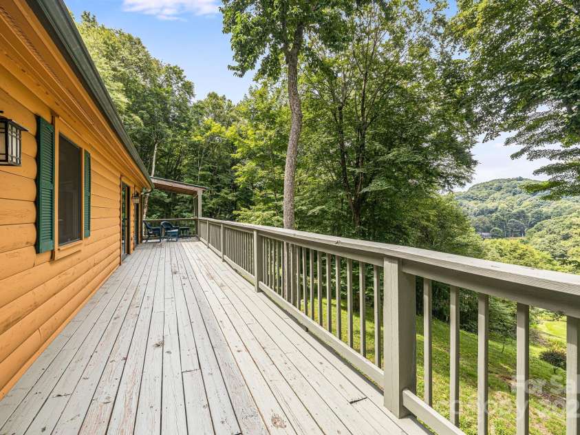 73 Oak Ridge Court, Mars Hill, NC 28754.  MLS# CAR4166537, YatesRealty ID 7165. Back deck overlooking the golf course and mountains.