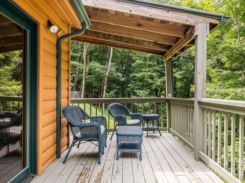 73 Oak Ridge Court, Mars Hill, NC 28754.  MLS# CAR4166537, YatesRealty ID 7165. Covered deck area.
