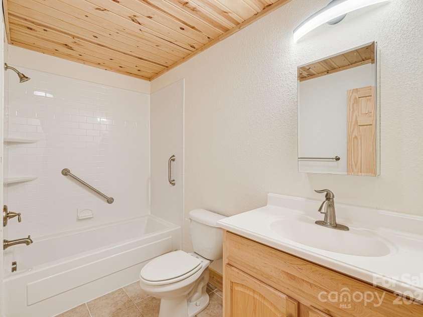 73 Oak Ridge Court, Mars Hill, NC 28754.  MLS# CAR4166537, YatesRealty ID 7165. Guest bathroom.
