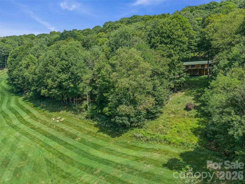 73 Oak Ridge Court, Mars Hill, NC 28754.  MLS# CAR4422938, YatesRealty ID 7165. Golf Course and Home