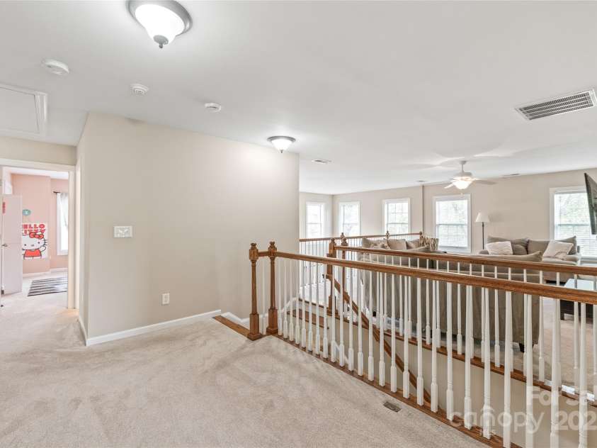 8905 Valleymoon Lane, Charlotte, NC 28214.  MLS# CAR4199406, YatesRealty ID 7165. Bedrooms to your left and living area to your right.