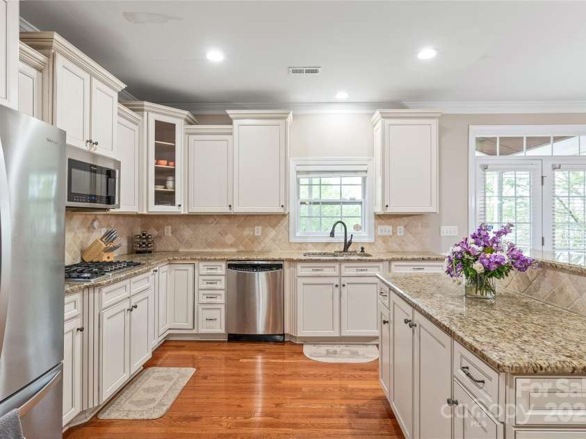 8905 Valleymoon Lane, Charlotte, NC 28214.  MLS# CAR4199406, YatesRealty ID 7165. Bountiful storage for all your things in stylish cabinetry