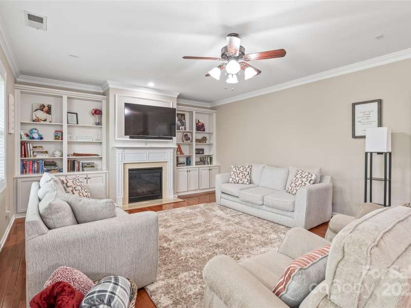 8905 Valleymoon Lane, Charlotte, NC 28214.  MLS# CAR4199406, YatesRealty ID 7165. Built-ins flank the gas fireplace