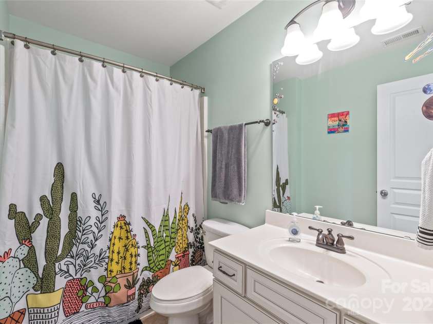 8905 Valleymoon Lane, Charlotte, NC 28214.  MLS# CAR4199406, YatesRealty ID 7165. Fourth Full Bath.... no sharing or having to wait here.