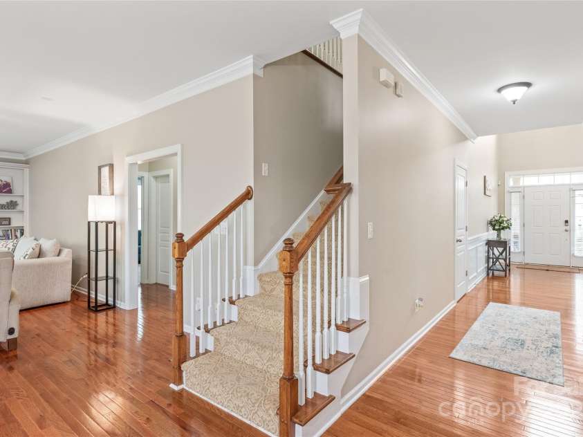 8905 Valleymoon Lane, Charlotte, NC 28214.  MLS# CAR4199406, YatesRealty ID 7165. Guest suite entrance and laundry to your left. Now, let's head upstairs....