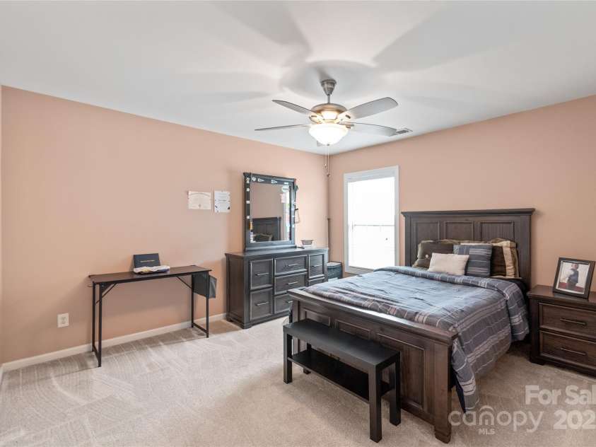 8905 Valleymoon Lane, Charlotte, NC 28214.  MLS# CAR4199406, YatesRealty ID 7165. Second-floor guest room #1 with double-door closet