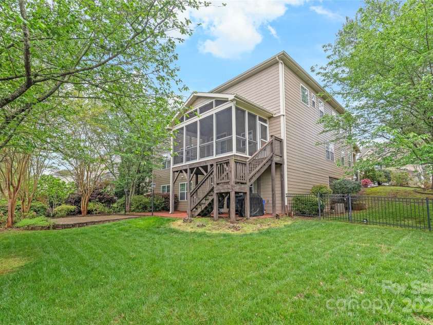 8905 Valleymoon Lane, Charlotte, NC 28214.  MLS# CAR4199406, YatesRealty ID 7165. Spacious corner lot with mature landscaping. The Camelias are blooming, and the Azaleas are just starting to pop.