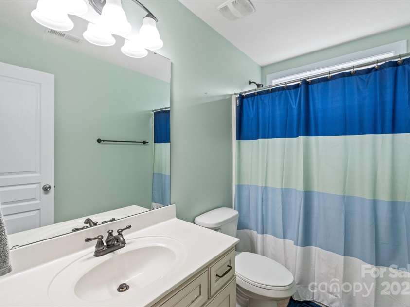 8905 Valleymoon Lane, Charlotte, NC 28214.  MLS# CAR4199406, YatesRealty ID 7165. Third full bath