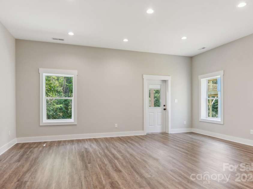 6 Escondido Drive, Asheville, NC 28806.  MLS# CAR4172412, YatesRealty ID 7166. Endless possibilities in the finished basement