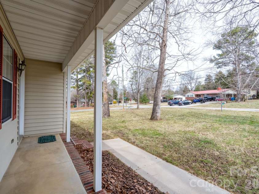 116 Stonybrook Road, Salisbury, NC 28147.  MLS# CAR4350728, YatesRealty ID 7178. Front yard view from front porch. Half acre corner lot.