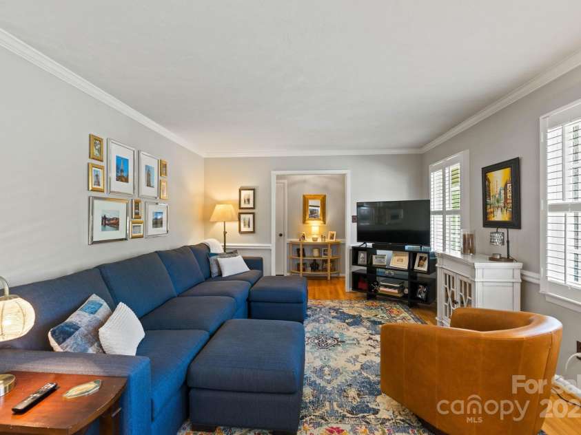 922 Hawthorne Drive, Lenoir, NC 28645.  MLS# CAR4246497, YatesRealty ID 7179. Den2 w/hardwood floors, plantation shutters and crown molding