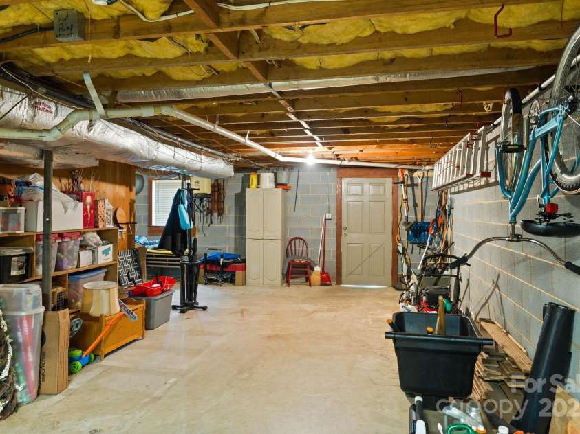 922 Hawthorne Drive, Lenoir, NC 28645.  MLS# CAR4246497, YatesRealty ID 7179. More basement storage space