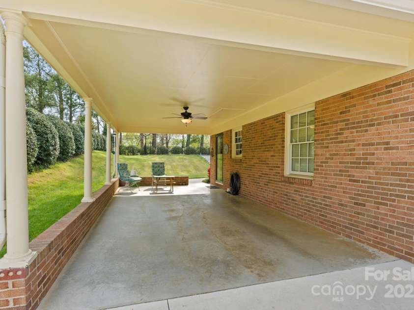 922 Hawthorne Drive, Lenoir, NC 28645.  MLS# CAR4246497, YatesRealty ID 7179. Single Car Carport