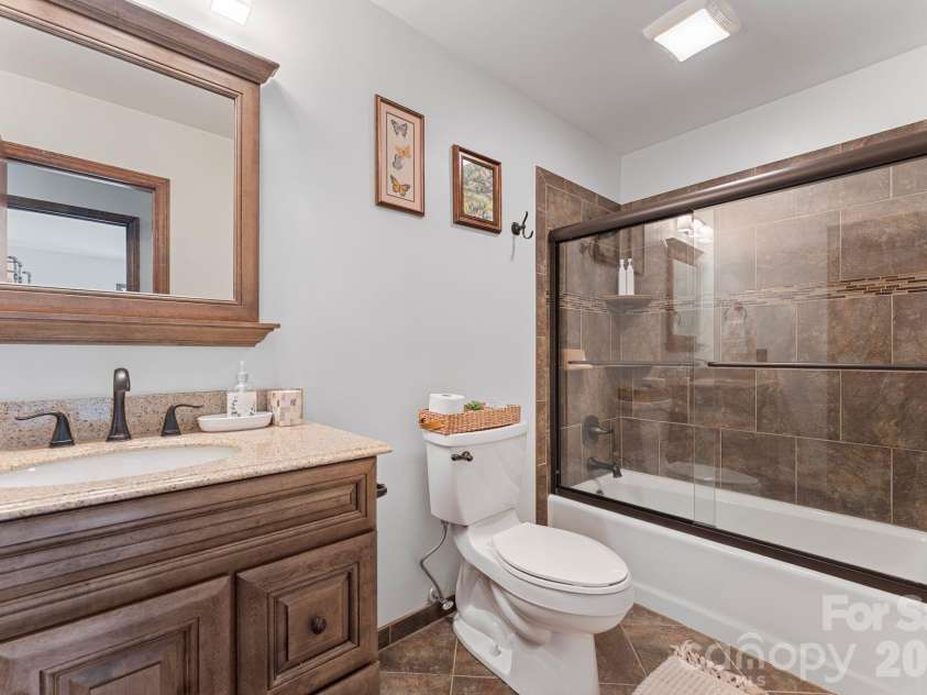 1432 Jules Court, Charlotte, NC 28226.  MLS# CAR4355299, YatesRealty ID 7181. Full bathroom on main level