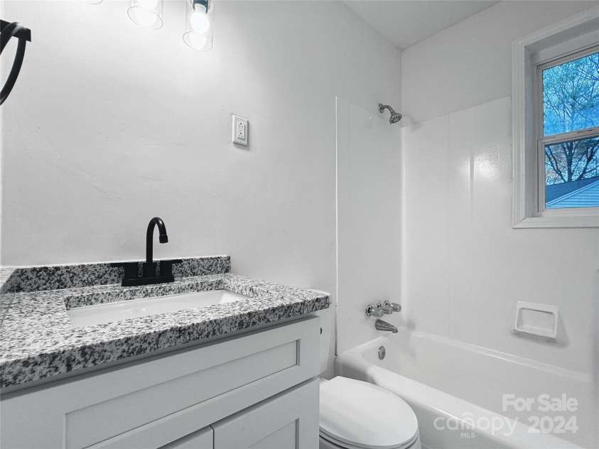 1908 Dickens Avenue, Charlotte, NC 28208.  MLS# CAR4205335, YatesRealty ID 7182. 