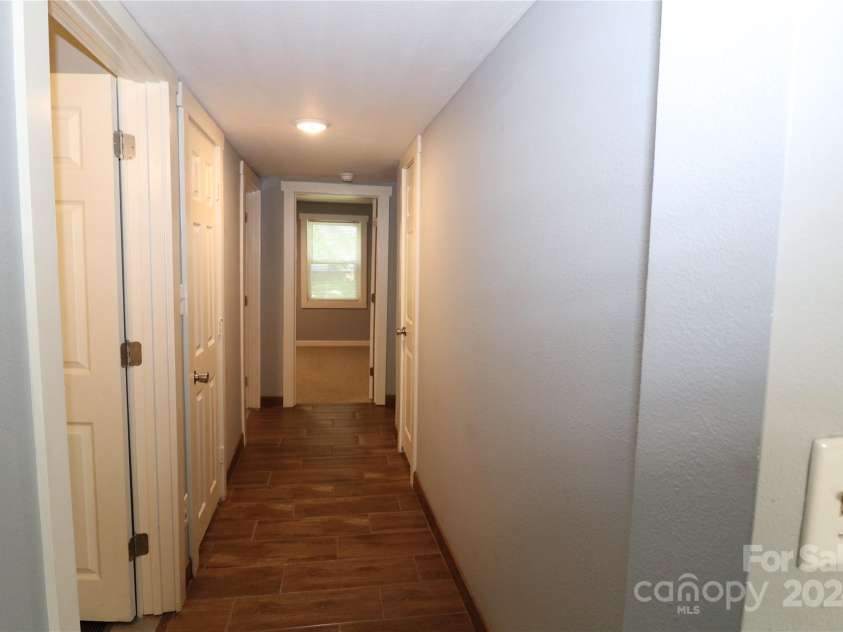 410 Clinton Drive, Kings Mountain, NC 28086.  MLS# CAR4156831, YatesRealty ID 7185. Hall to 2 Bedrooms and Laundry Room