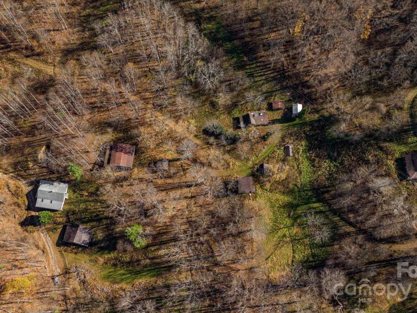 340 Wendy Avenue, Marshall, NC 28753.  MLS# CAR4210108, YatesRealty ID 7191. View of home and surrounding buildings