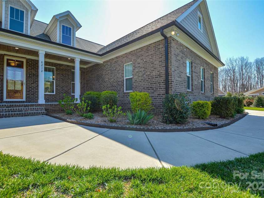 8212 Bennett Lane, Sherrills Ford, NC 28673.  MLS# CAR4239561, YatesRealty ID 7192. Front Porch and Garage