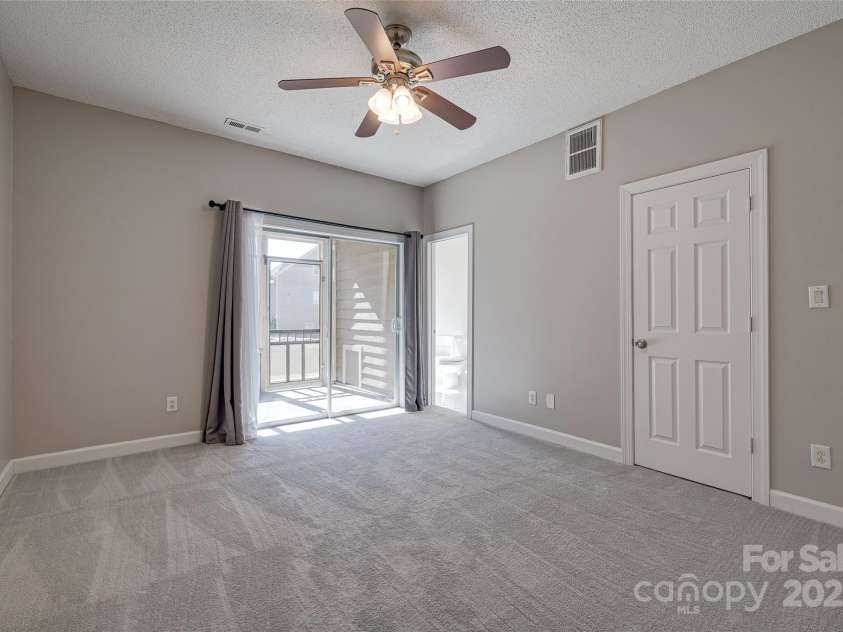14106 Yachtsman Harbor Drive, Charlotte, NC 28278.  MLS# CAR4221329, YatesRealty ID 7195. New carpet installed February 2025 on the stairs and in both bedrooms.