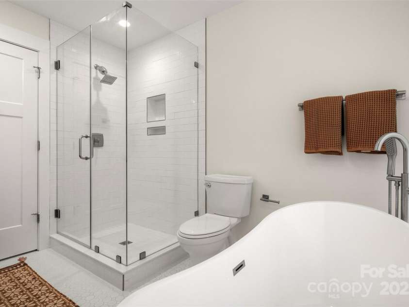 15 Hemlock Drive, Asheville, NC 28806.  MLS# CAR4232491, YatesRealty ID 7197. Glass enclosed walk-in shower