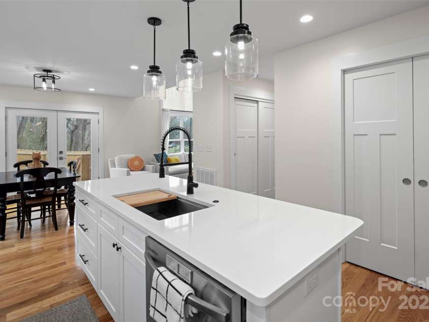 15 Hemlock Drive, Asheville, NC 28806.  MLS# CAR4232491, YatesRealty ID 7197. Pocket doors lead to the oversized pantry