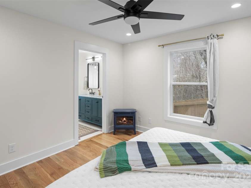 15 Hemlock Drive, Asheville, NC 28806.  MLS# CAR4232491, YatesRealty ID 7197. Primary bedroom looking toward the en-suite bathroom entrance