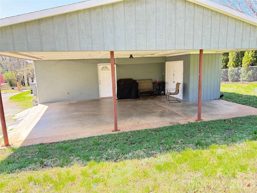 316 Sharon Avenue, Lenoir, NC 28645.  MLS# CAR4361436, YatesRealty ID 7202. Carport